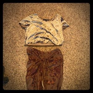 A crop top and skirt